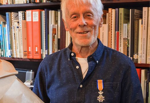 Toon Timmermans met zijn lintje